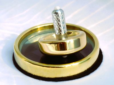 Cairnspire top set with brass ring, glass base, and felt cushion
